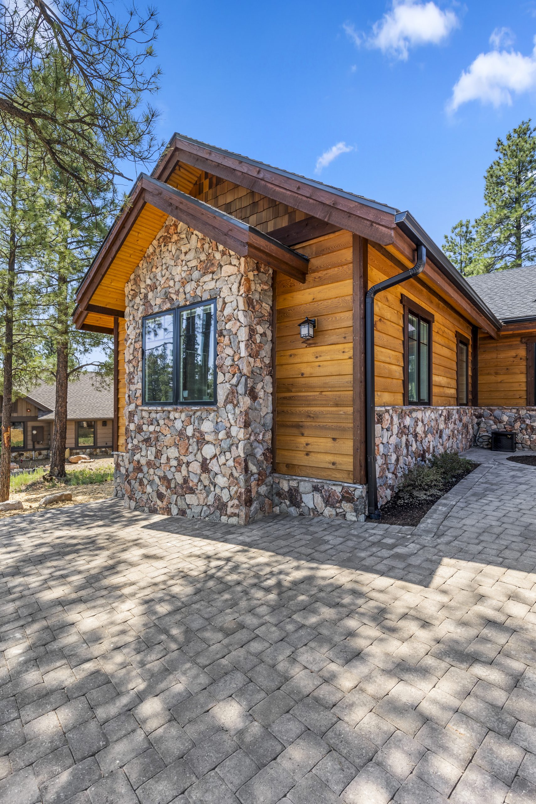 custom home remodel details including the stone and wood finishings