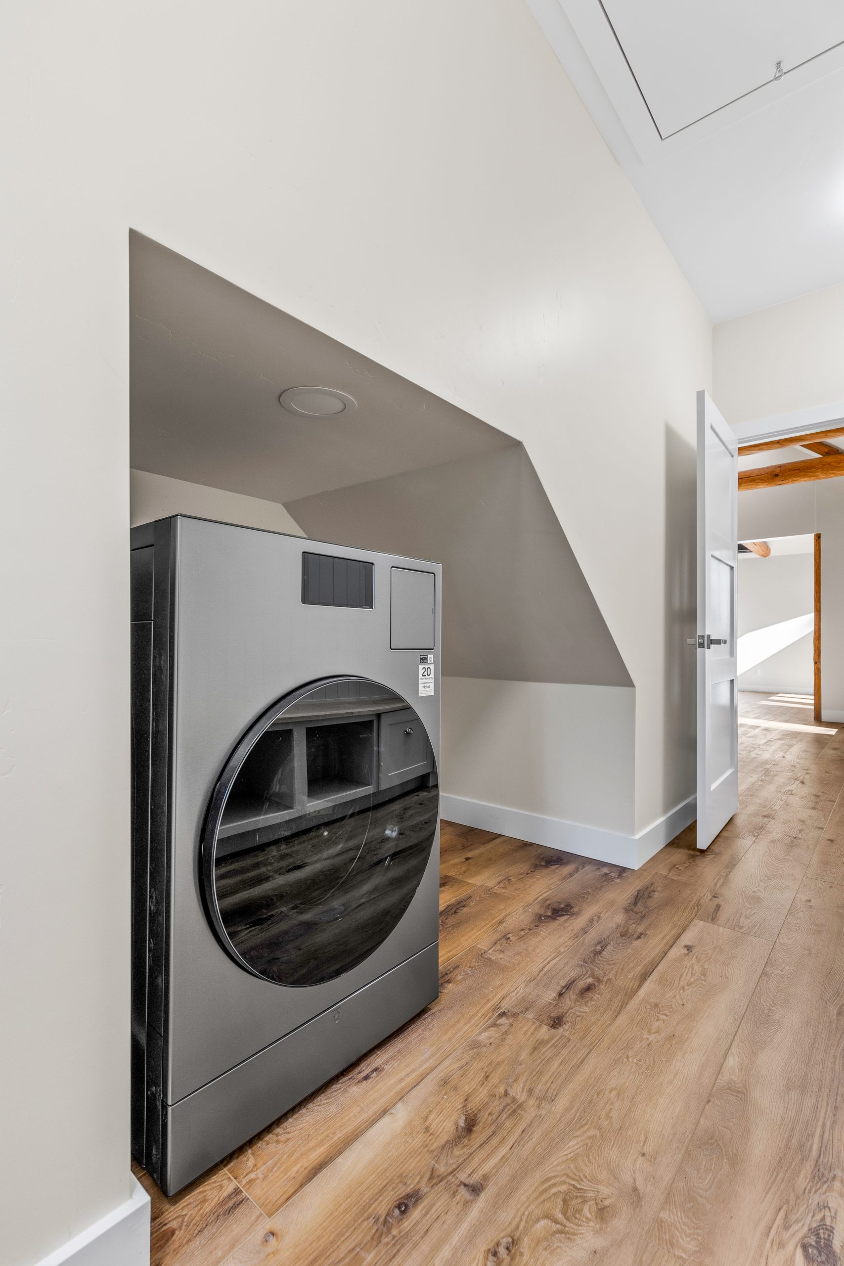 remodeled laundry nook below the stairs